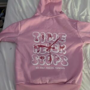 Pink hoodie with inspirational quote on the back